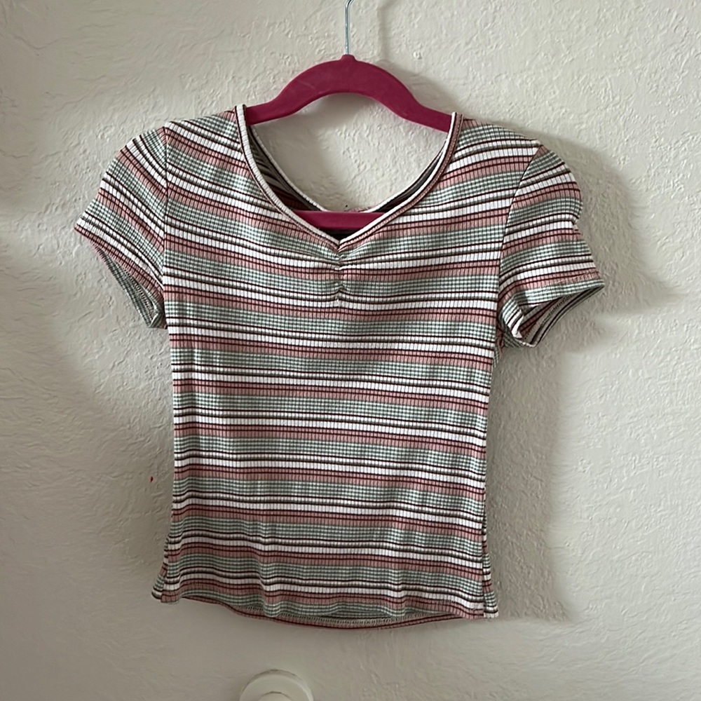 Women’s Extra Small top from Tillys/ White Fawn.